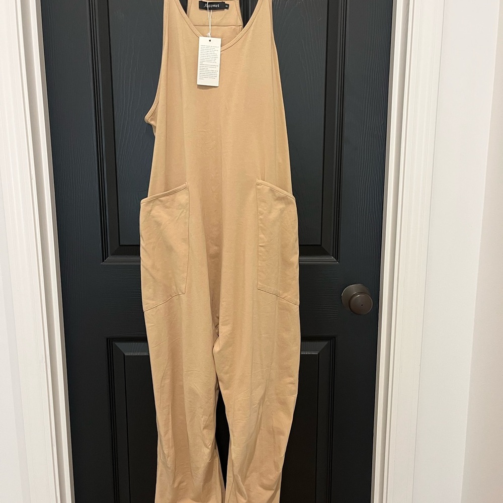 Cream Sleeveless Jumpsuit with V-Neck and Relaxed Fit